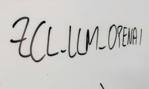 Photograph of a whiteboard with “ZCL-LLM-OPENAI” written on it. Photograph of a whiteboard with “ZCL-LLM-OPENAI” written on it.