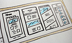 Photograph of a screen illustration showing four mobile application screen mockups.