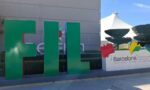 Photograph of the sign for the 2025 Feira Internacional del Libro 2025 in front of a building under a blue sky